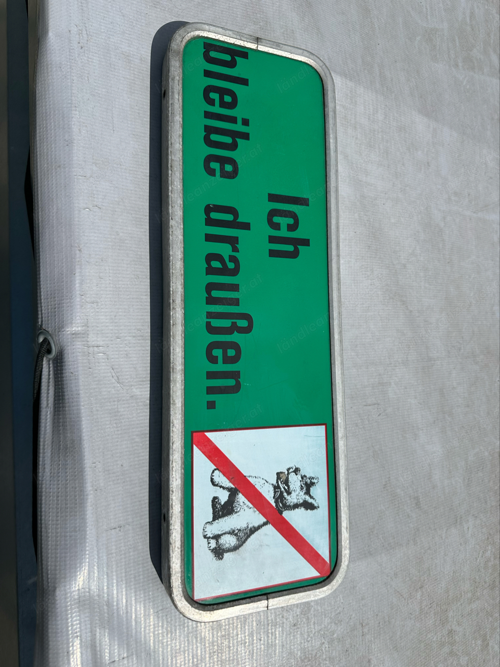 Schild  48x16 cm auf Alurahmen