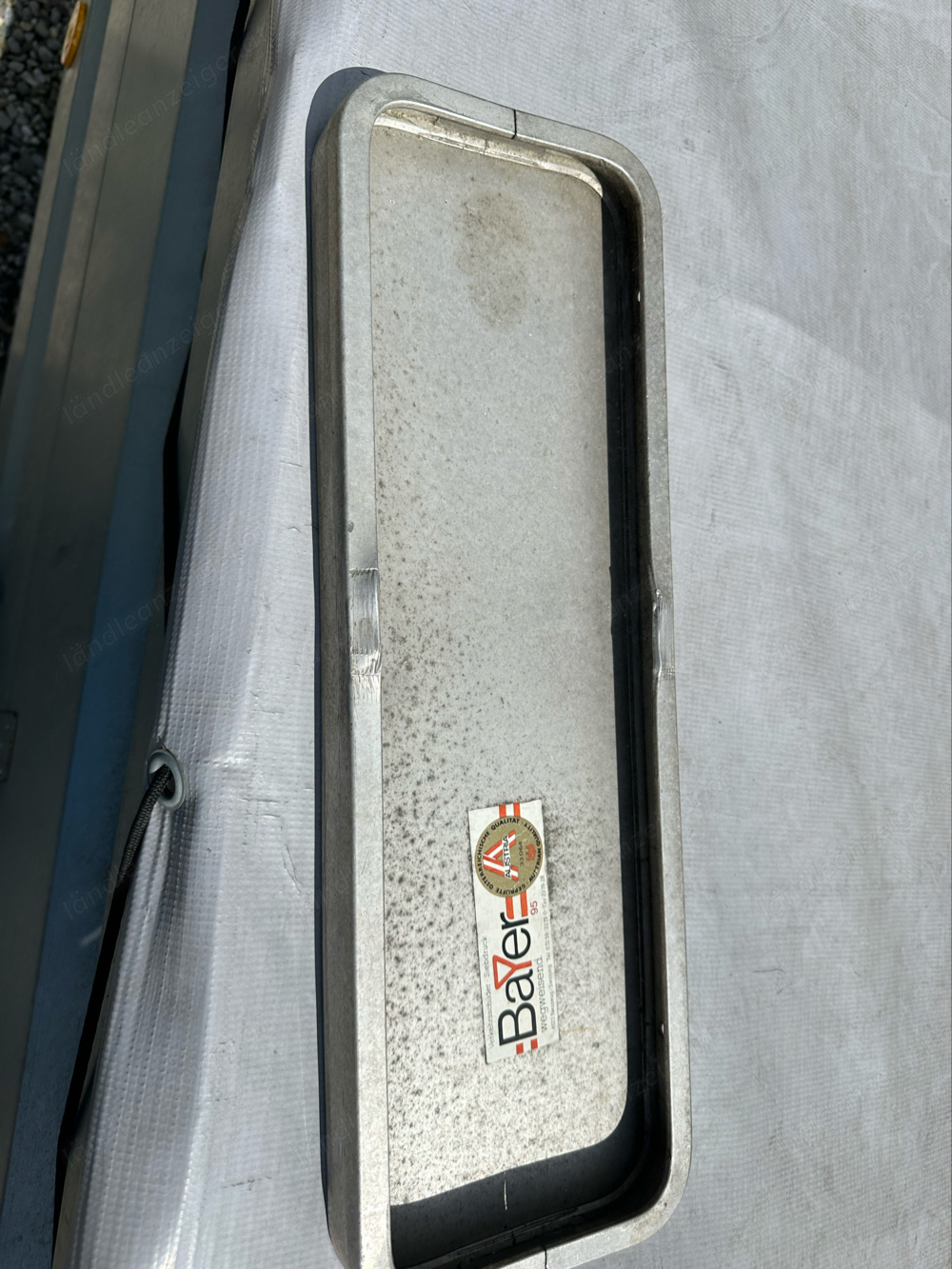 Schild  48x16 cm auf Alurahmen