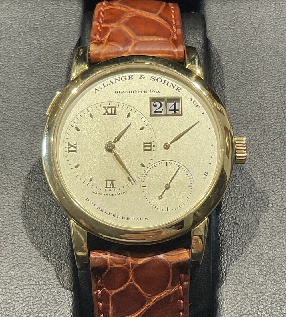 Lange & Söhne Lange 1 Originalband 750er Gold D=38,5mm Saphirglas,53 Rubine 98g