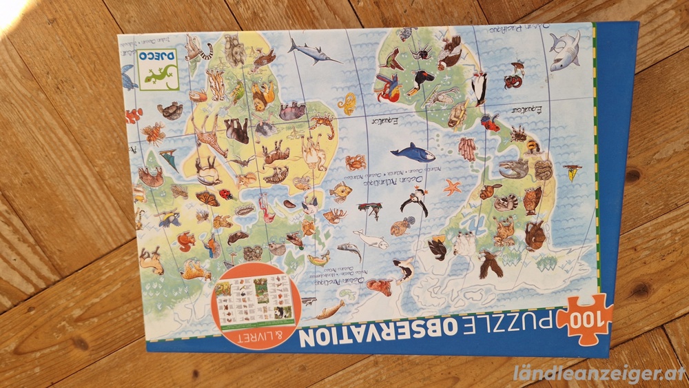 Puzzle Weltkarte mit Buch