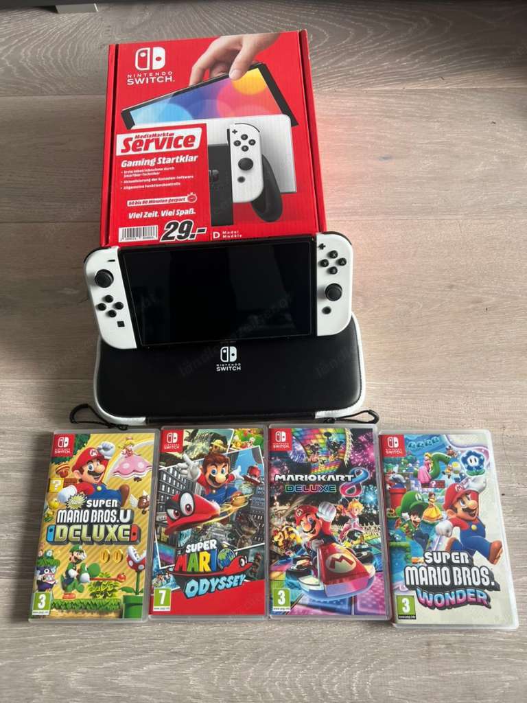 Nintendo Switch Oled mit 4 Spiele