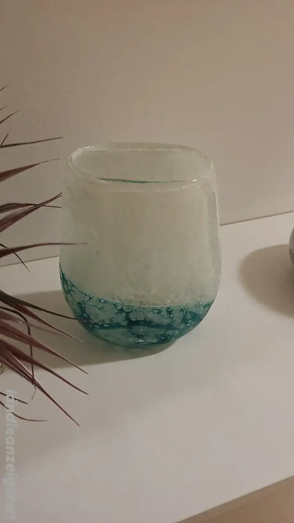 Türkisfarbene Blumenvase Türkisfarbene Blumenvase