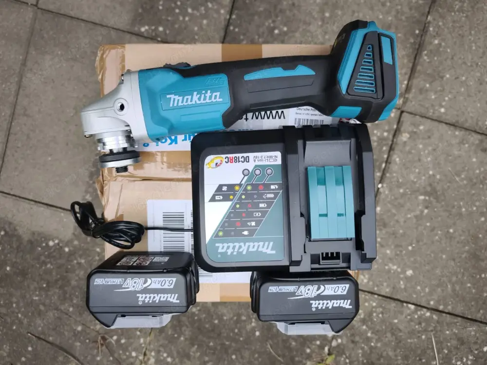 Winkelschleifer Makita DGA 404 mit 2 Akkus 6AH und Ladegerät Winkelschleifer Makita DGA 404 mit 2 Akkus 6AH und Ladegerät