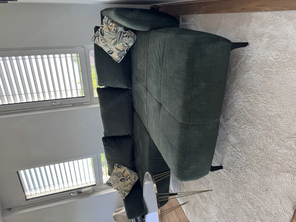 Ecksofa in Dunkelgrün Ecksofa in Dunkelgrün