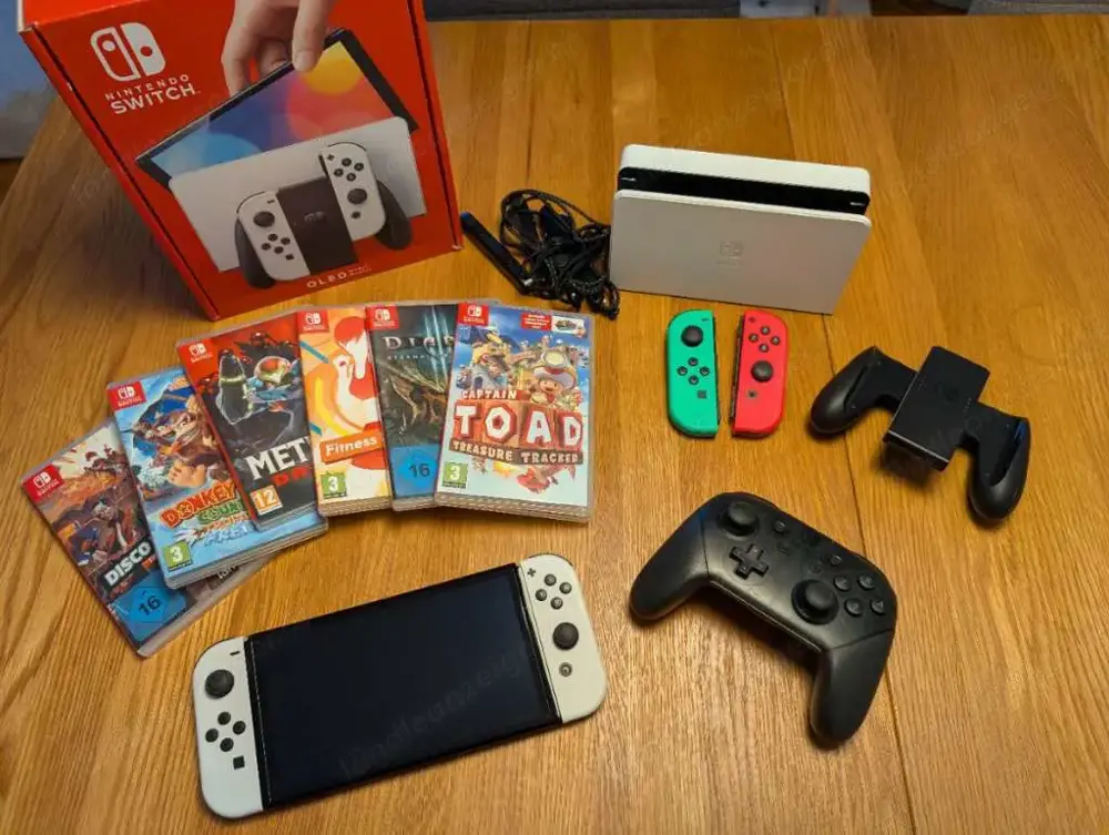 Nintendo Switch OLED + Spiele Nintendo Switch OLED + Spiele