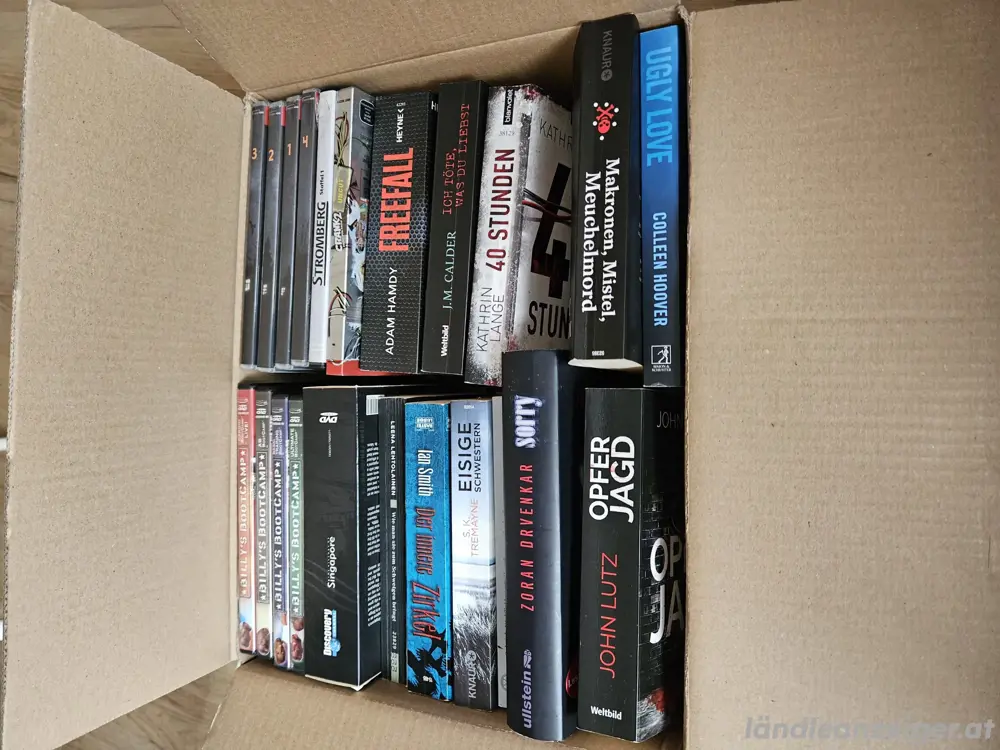 1 Schachtel voll mit Dvd's und Büchern abzugeben 1 Schachtel voll mit Dvd's und Büchern abzugeben