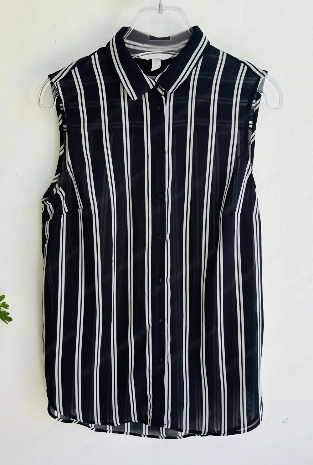 Gestreifte ärmellose Bluse von H&M Gestreifte ärmellose Bluse von H&M