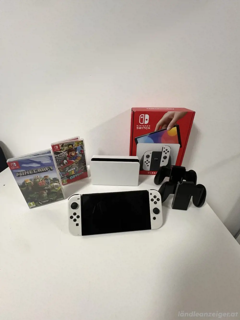 Tragbare Nintendo Switch OLED-Modell HEG-001-Konsole 64 GB Weiß Tragbare Nintendo Switch OLED-Modell HEG-001-Konsole 64 GB Weiß