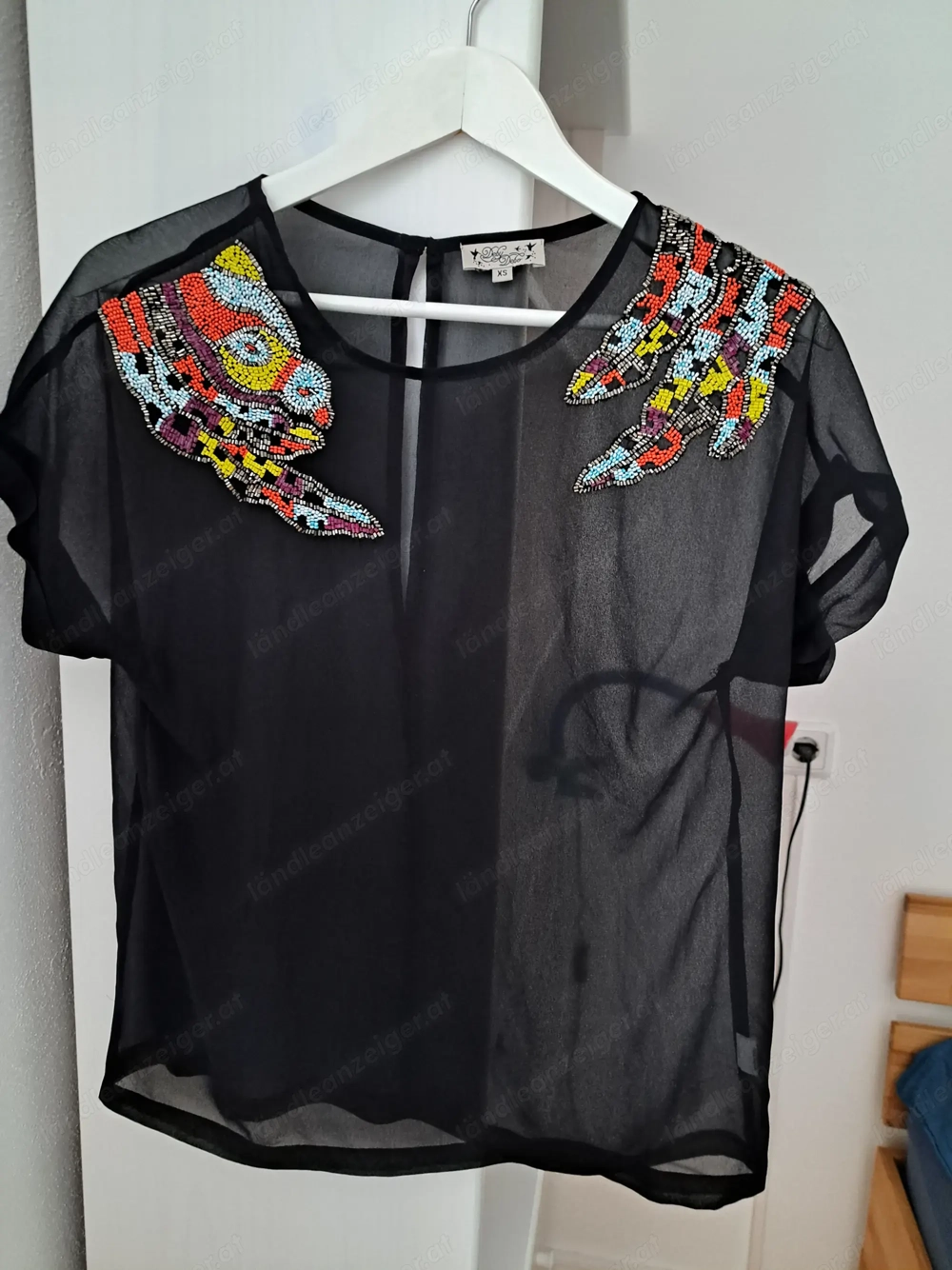 Wunderschöne damenbluse, schwarz, mit Pailletten 