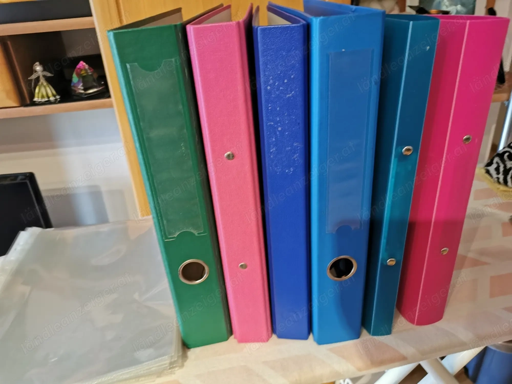 5 Stk. Ordner u. 10 Stk. Klarsichthüllen