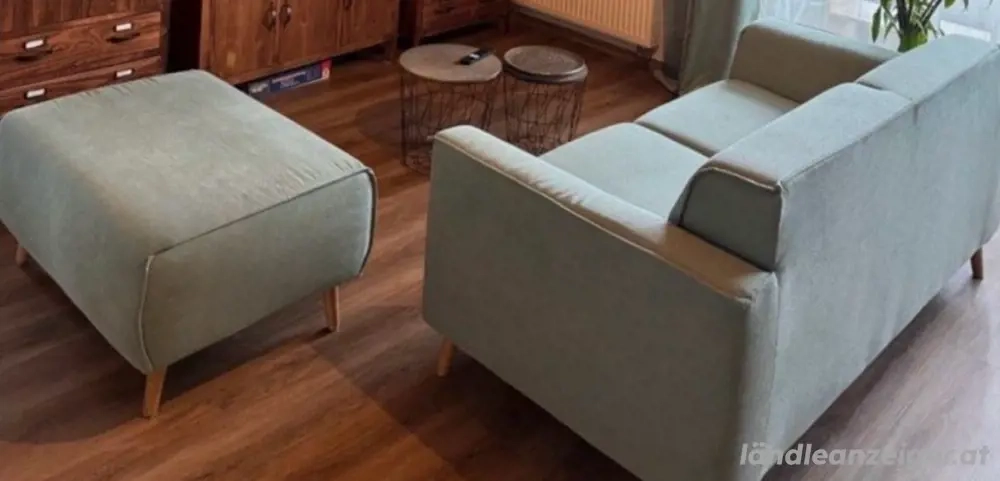 Designer Couch mint-farben mit Hocker 
