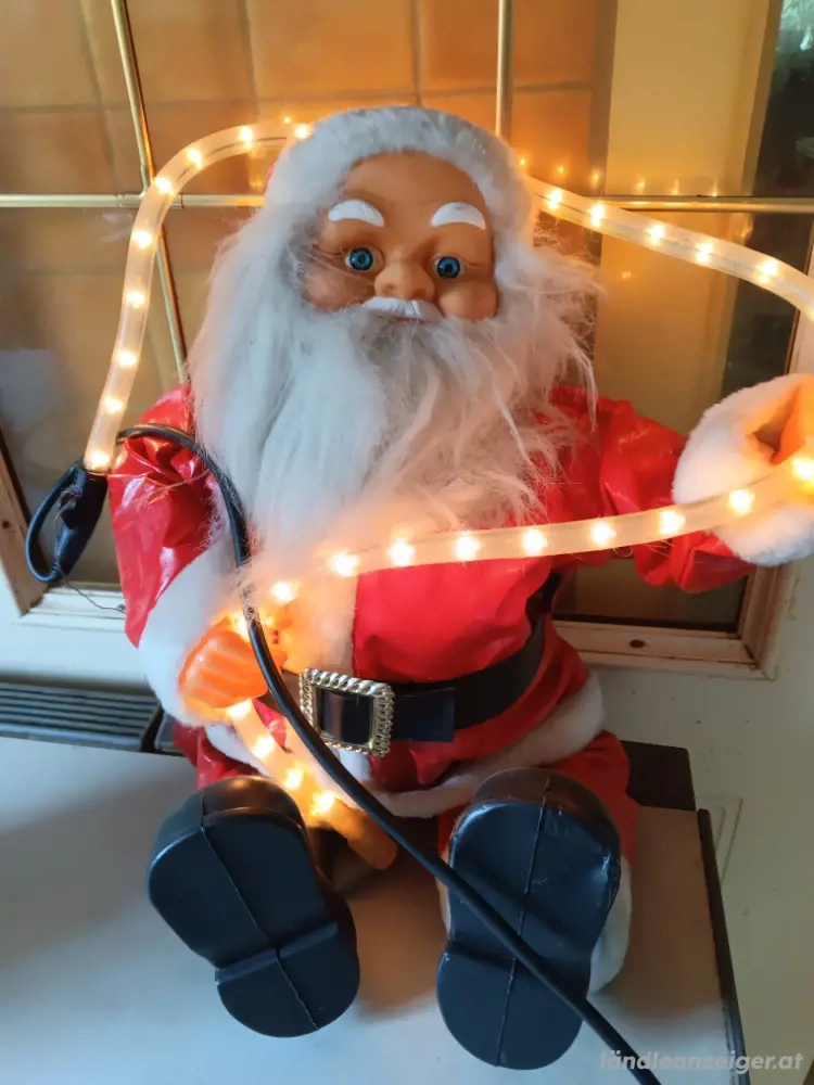 Kletternder Weihnachtsmann 