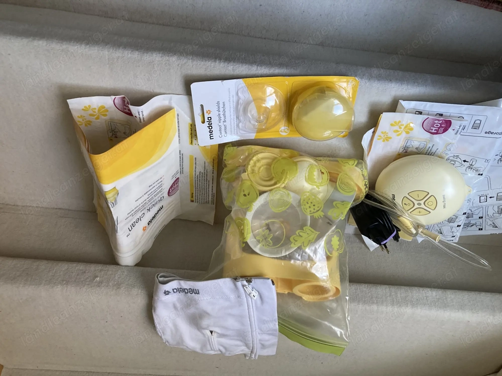 Medela Milchpumpe , fast neu mit vielerlei Zubehör