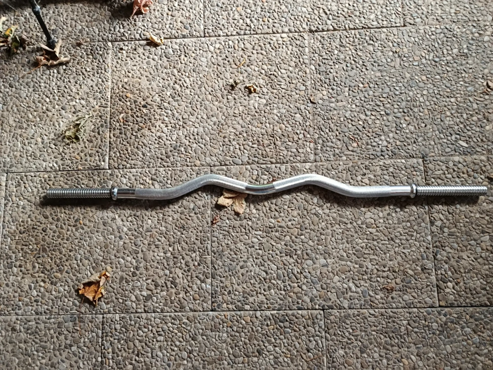 Hantelstange & 6 Crane Gewichtscheiben a 7Kg