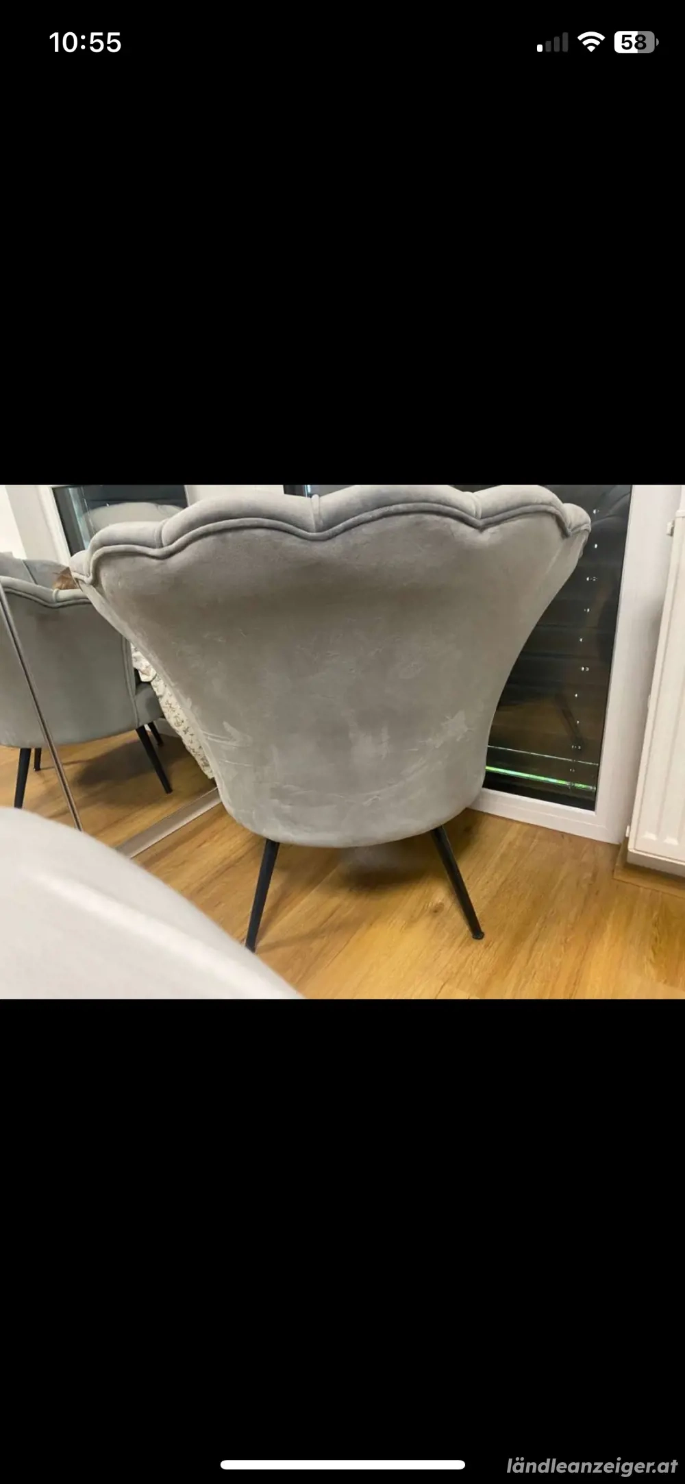 Sessel in Muschelform grau