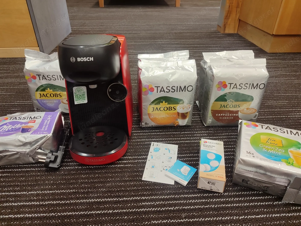 Tassimo Kaffeemaschine Rot incl. Kaffee und Entkalungstabletten 