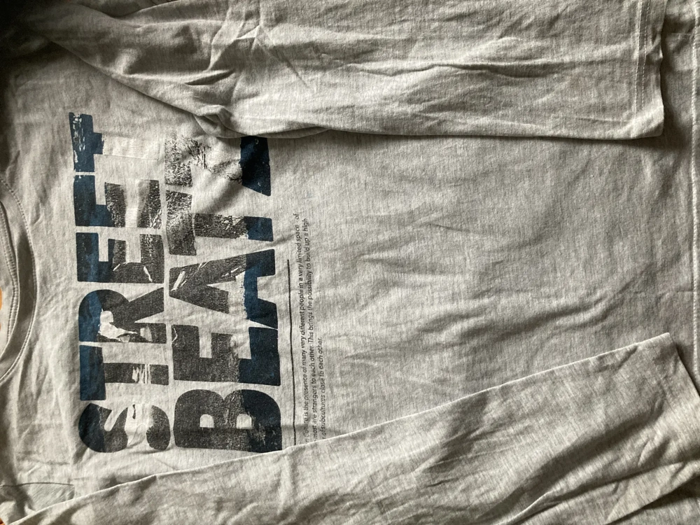 Langarmiges Shirt von Takko Größe 170 mit kleinen Fehler 