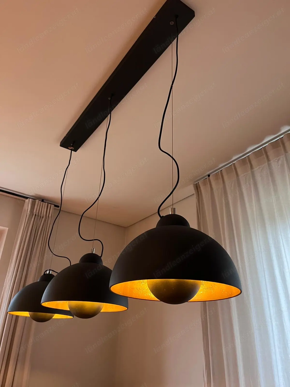 Hängeleuchte "Sattelight" schwarz gold