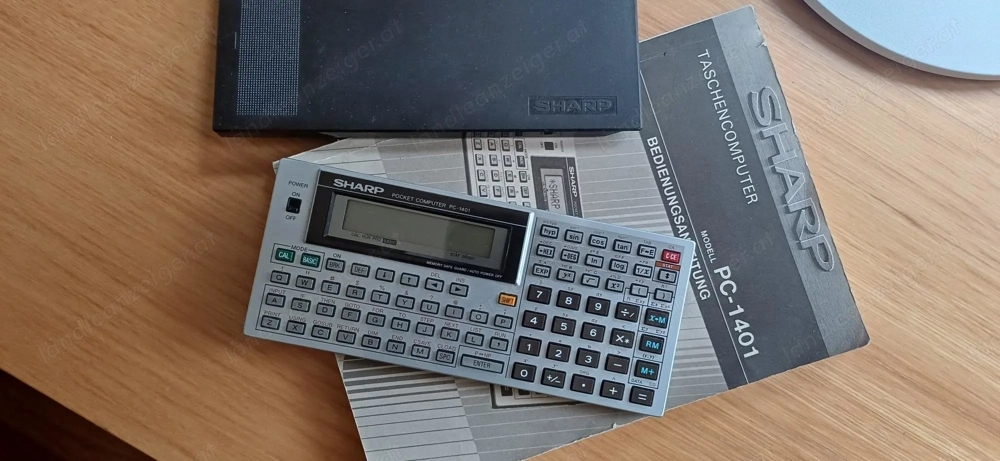 Bild der Anzeige Sharp Taschencomputer PC-1401 mit Bedienungsanleitung vintage