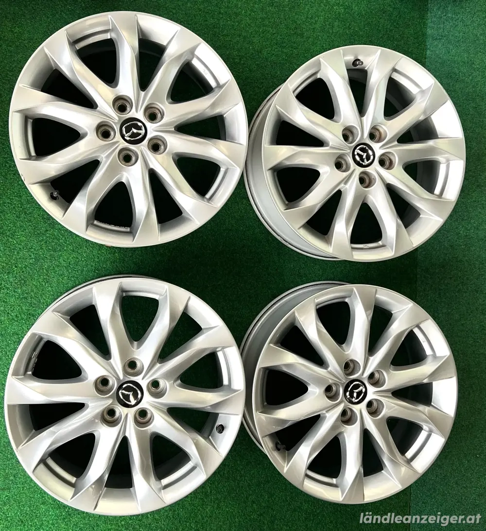 Original Mazda 3 Alufelgen 18 Zoll   7Jx18 ET50   5x114,3   mit Nabendeckel   4 Stk.