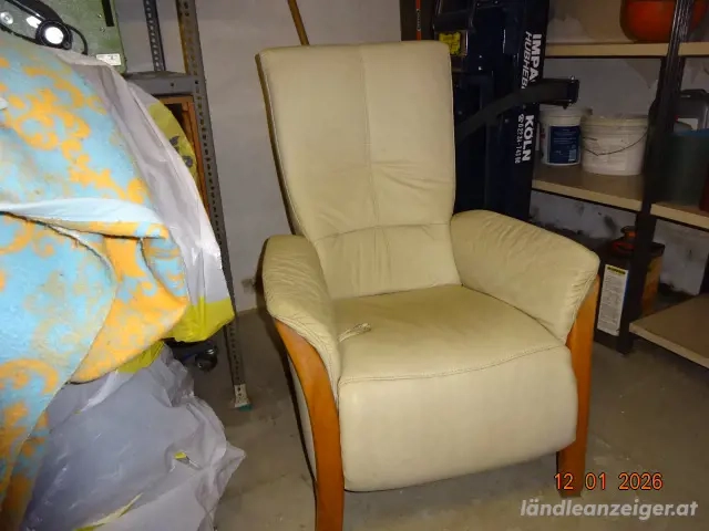 Sessel in Leder und Fusshochteil