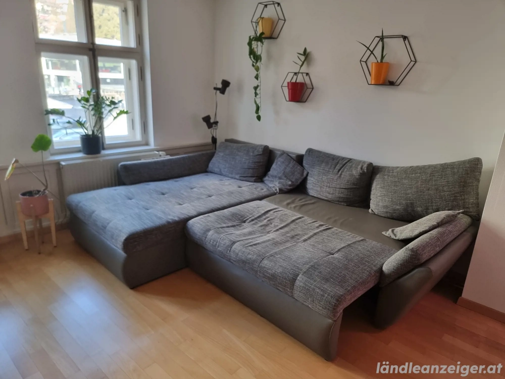 (zu verschenken) Eckcouch Grau mit Schlaffunktion & Bettkasten - für Bastler