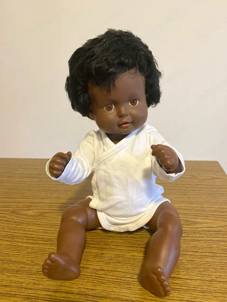 Puppe schwarz Schildkröt