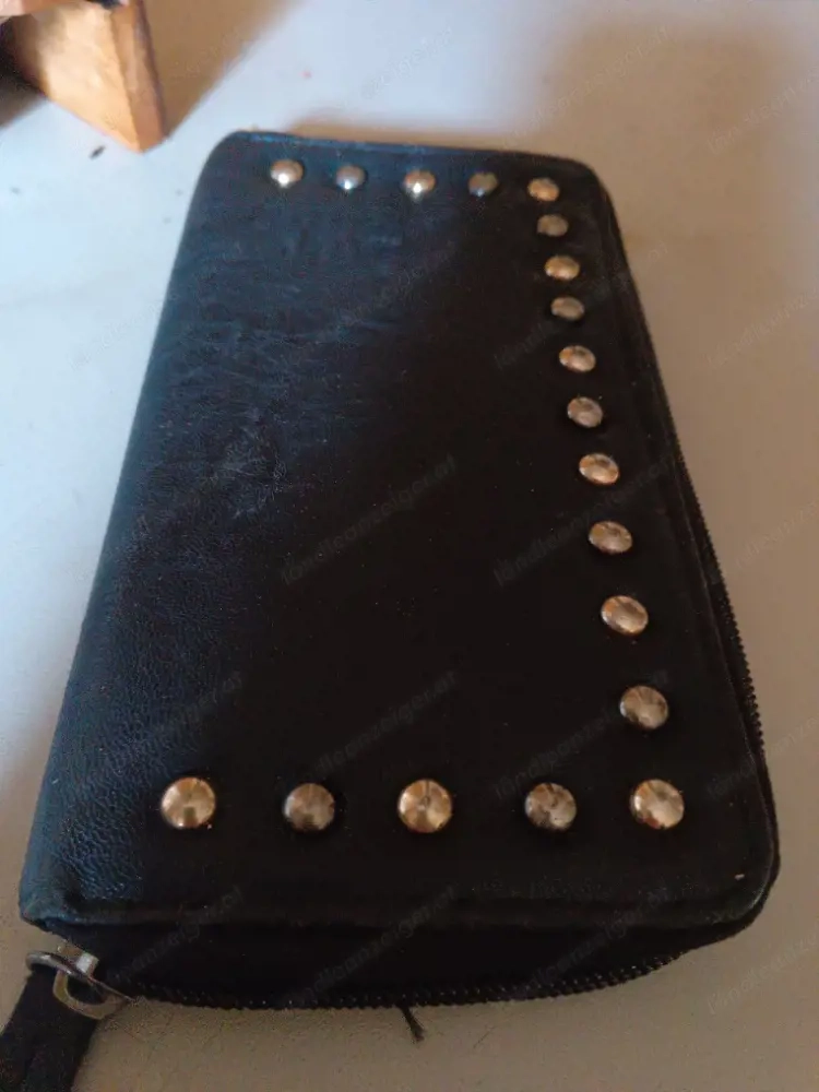 Ledergeldbörse m.Nieten.