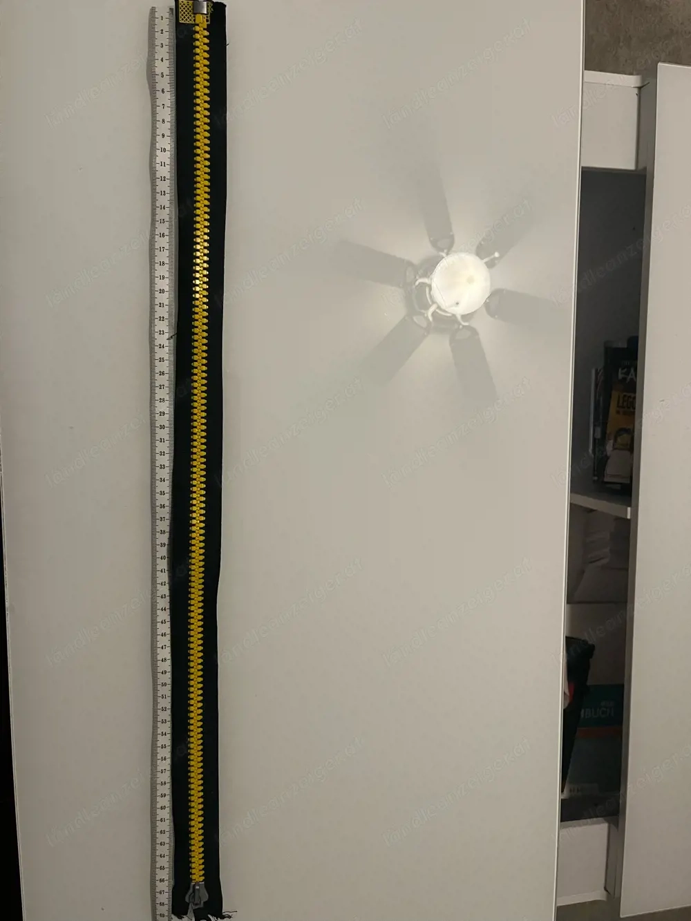 Reissverschluss schwarz  gelb 670 mm