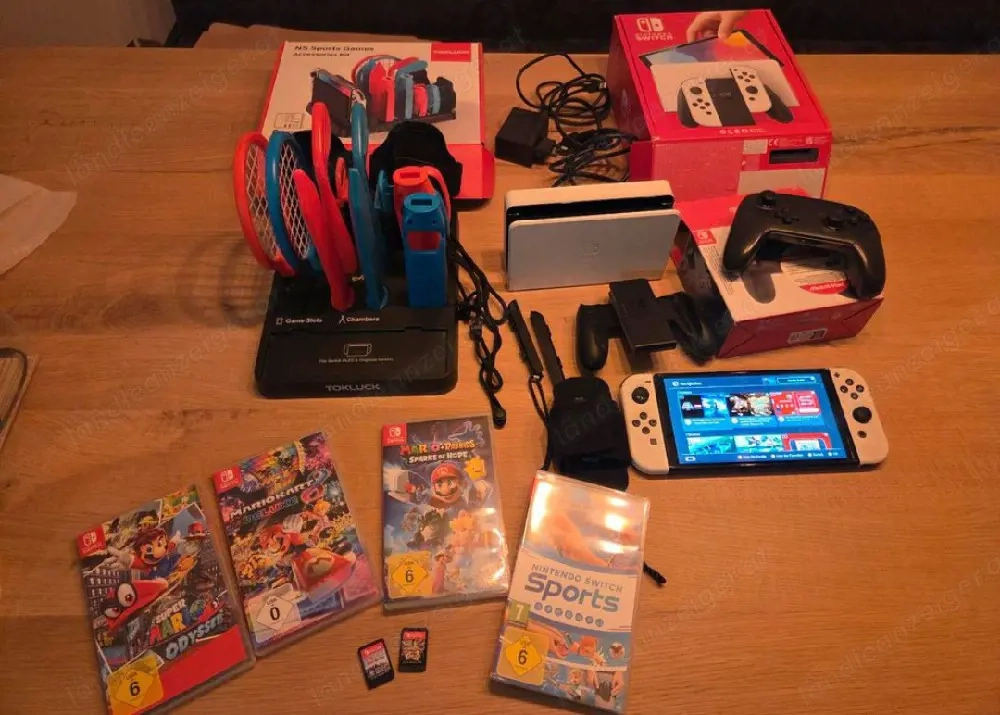 Nintendo Switch OLED+Spielen Komplettpaket + Zubehör
