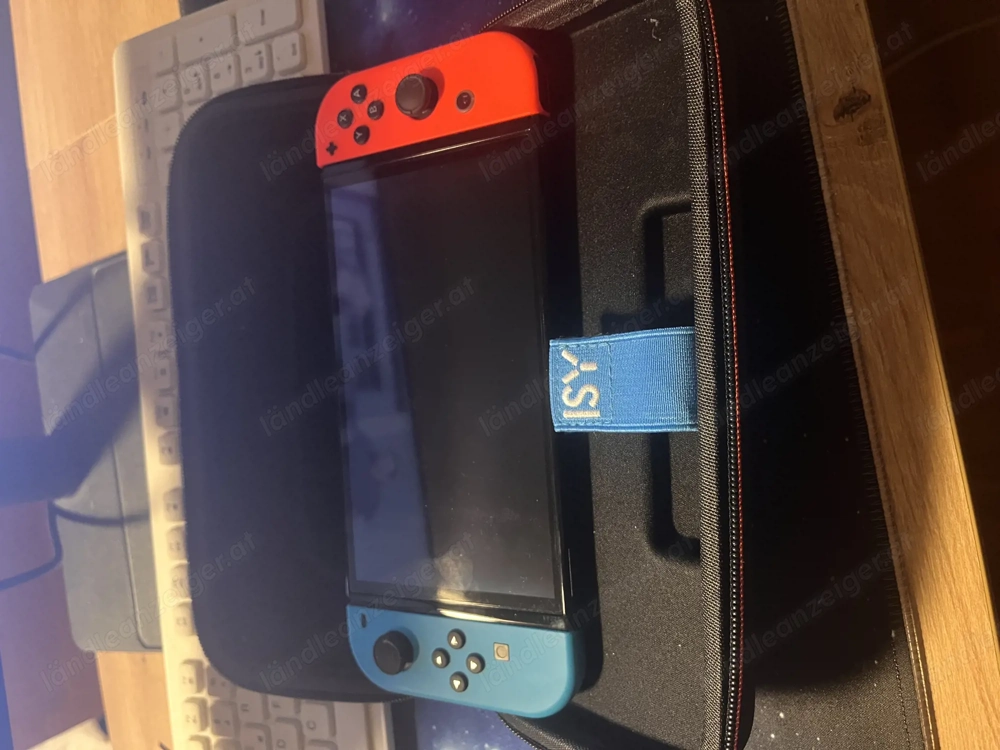 Nintendo Switch OLED mit EA FC 25, Human Fall Flat