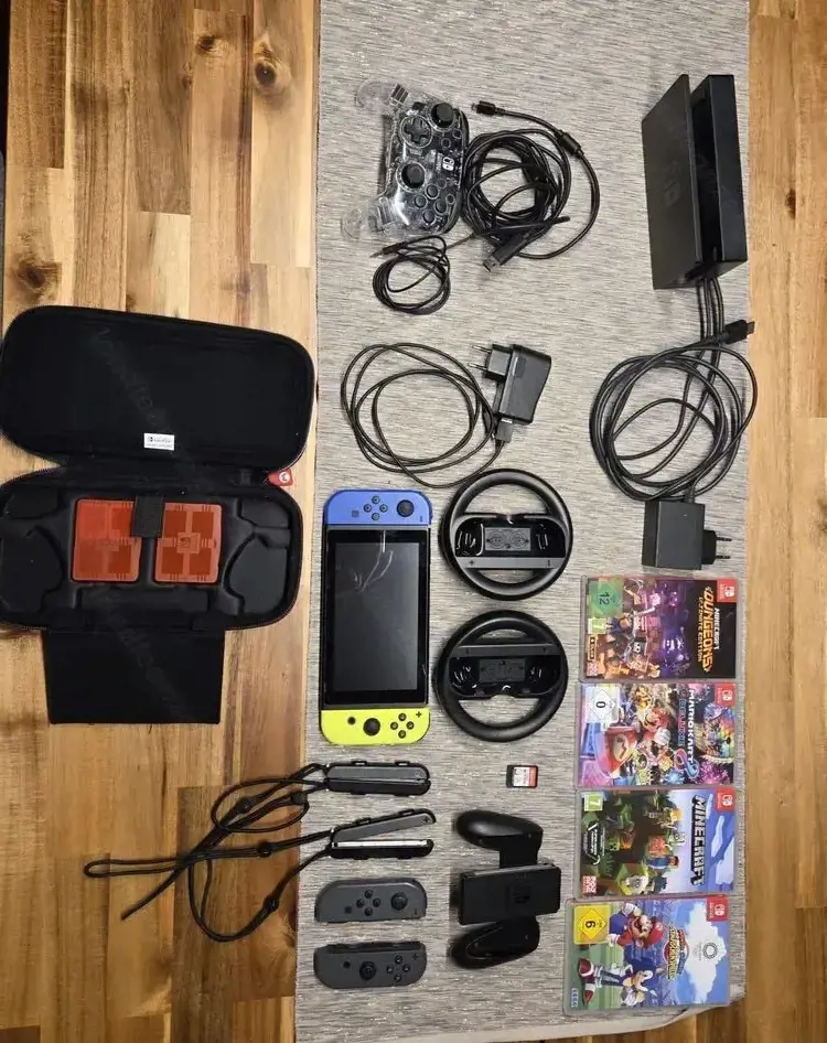 Nintendo Switch Konsole mit viel Zubehör und Spiele!