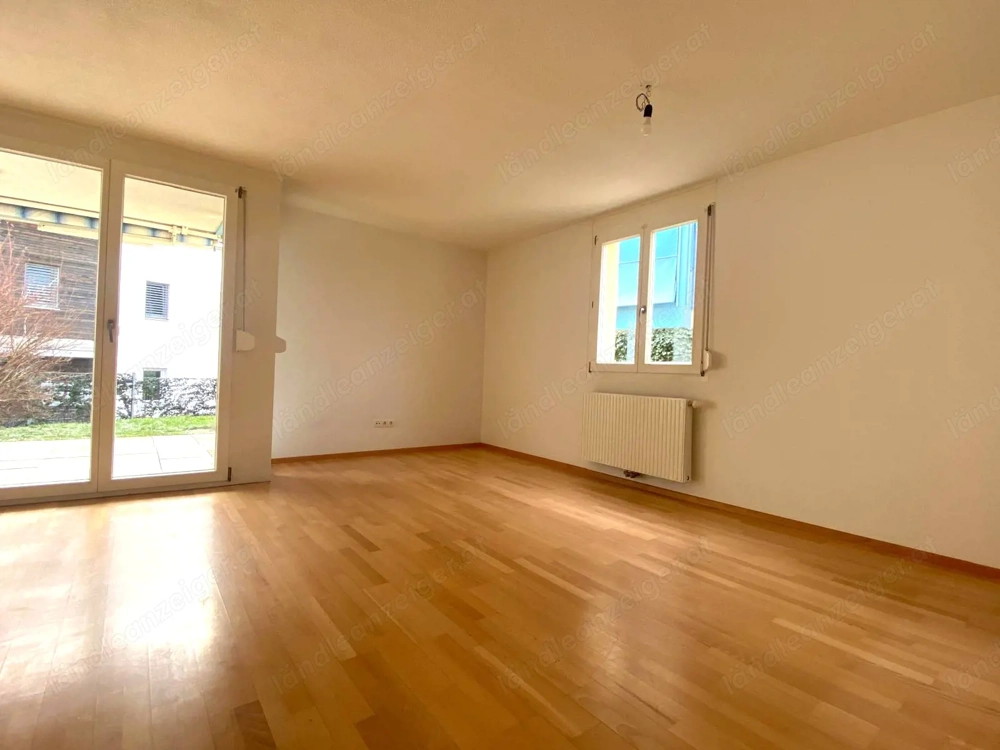 Sanierte 3-Zimmer Gartenwohnung mit Garage, Terrasse, Garten und Keller in Top-Lage!