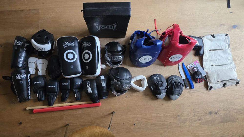 Schutzausrüstung und Pratzen