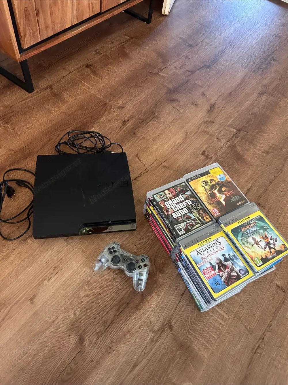 Playstation mit knapp 30 Spielen 