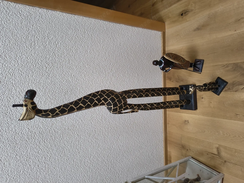 Zwei Giraffen und ein Massei