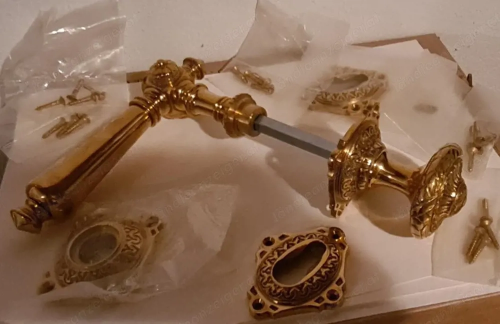 Türklinke mit Rosette aus Messing neu ungebraucht