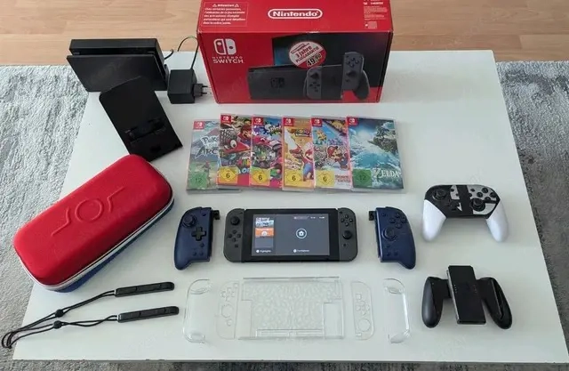 Nintendo Switch Konsole mit 6 Spielen + Zubehörpaket