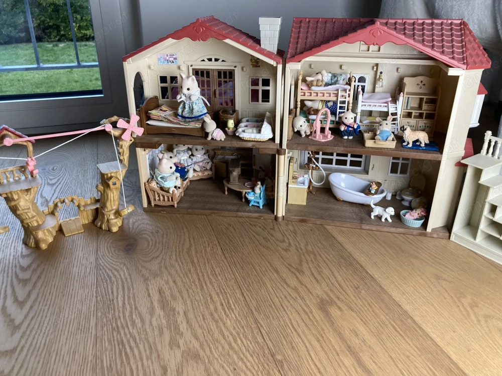 Sylvanian Stadthaus inklusive Einrichtung und vielen Figuren