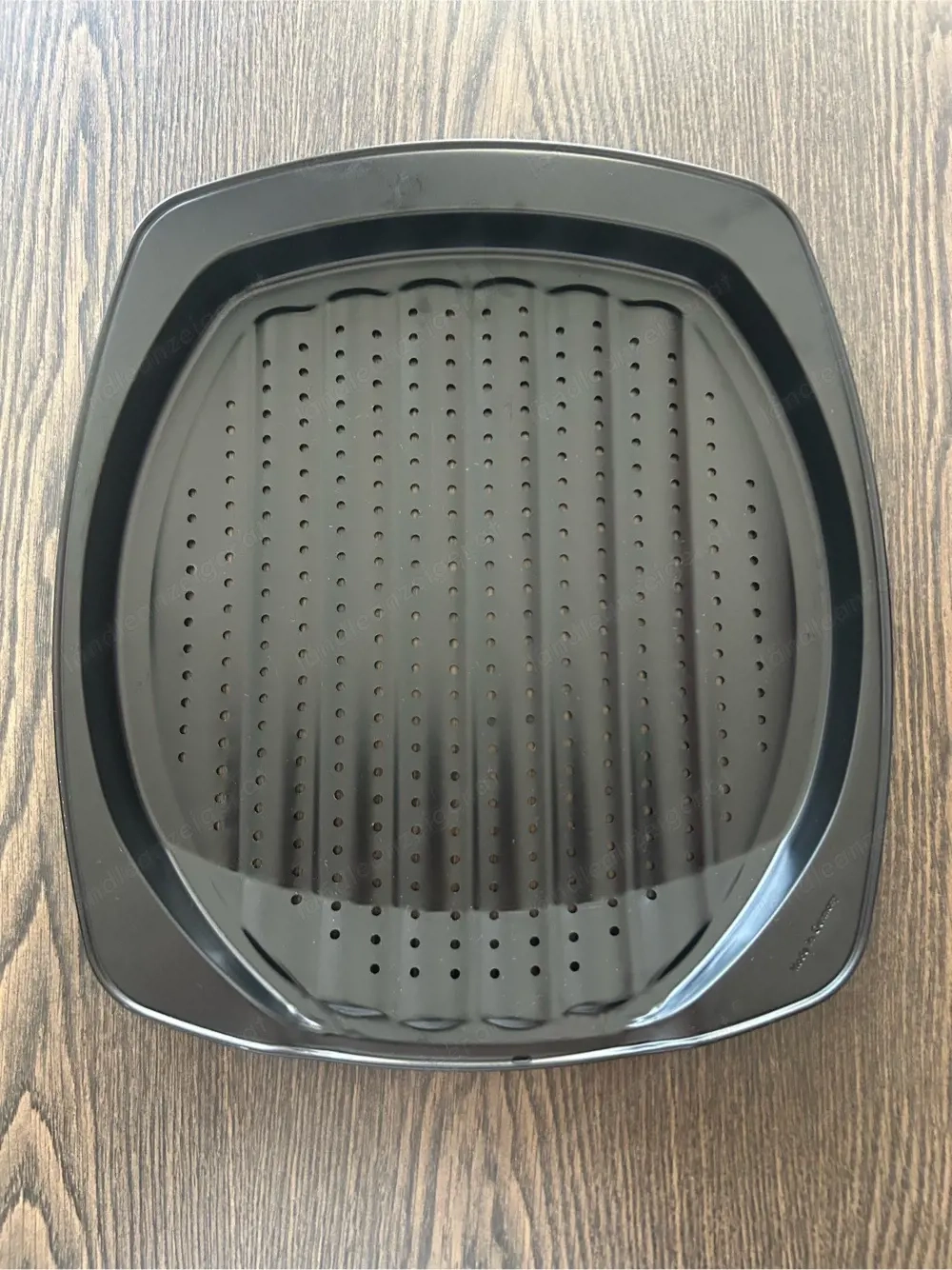 Tchibo Lochbackblech