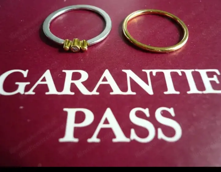 1 Brilliant Ring 0,02ct Diamant, Platin 950K, 1 Gelbgold-Ring 750K, zusammen als Doppelringe!