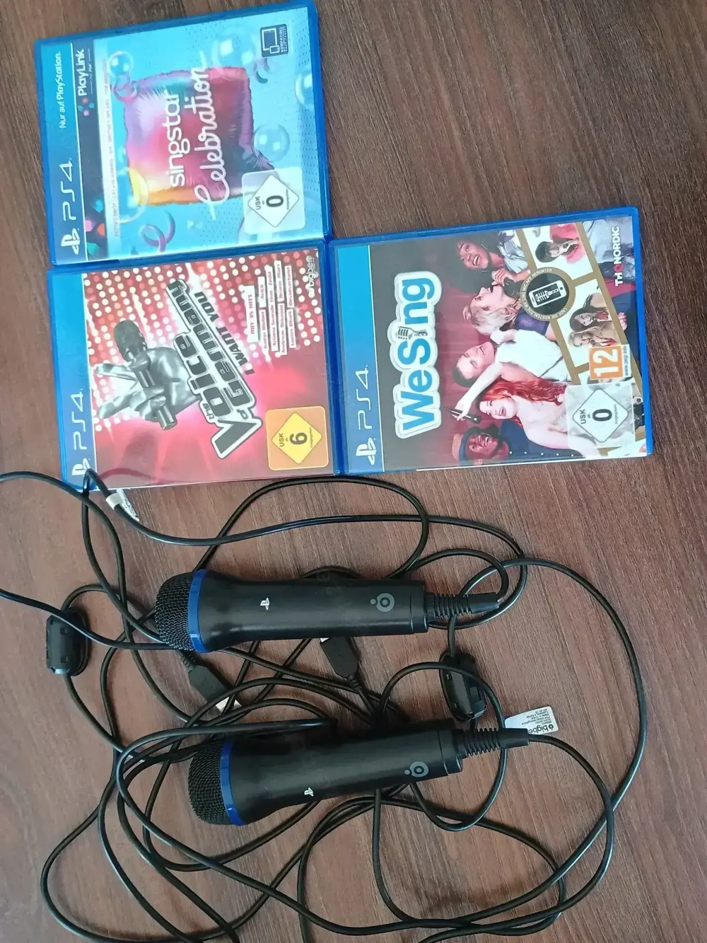 PlayStation 4 Spiele + zwei Mikrofone