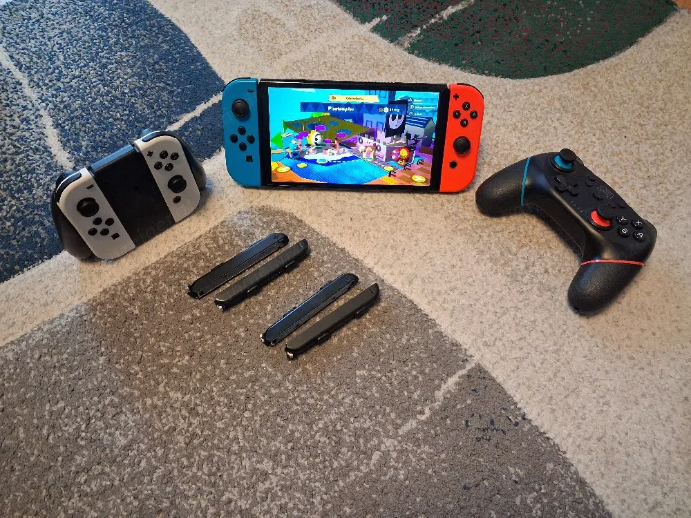 Nintendo Switch OLED + 4 Joy-Cons + Wireless Controller   Top Zustand