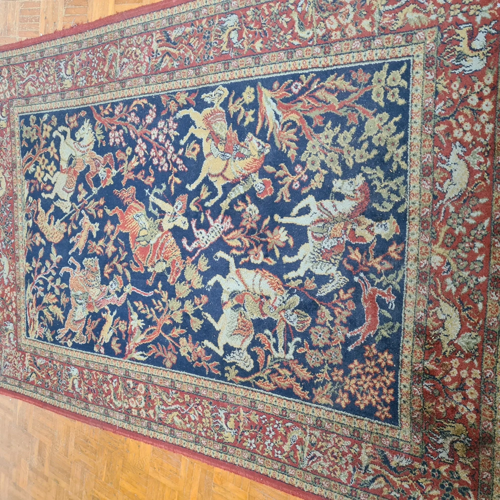 Teppich in Rottönen zu verschenken