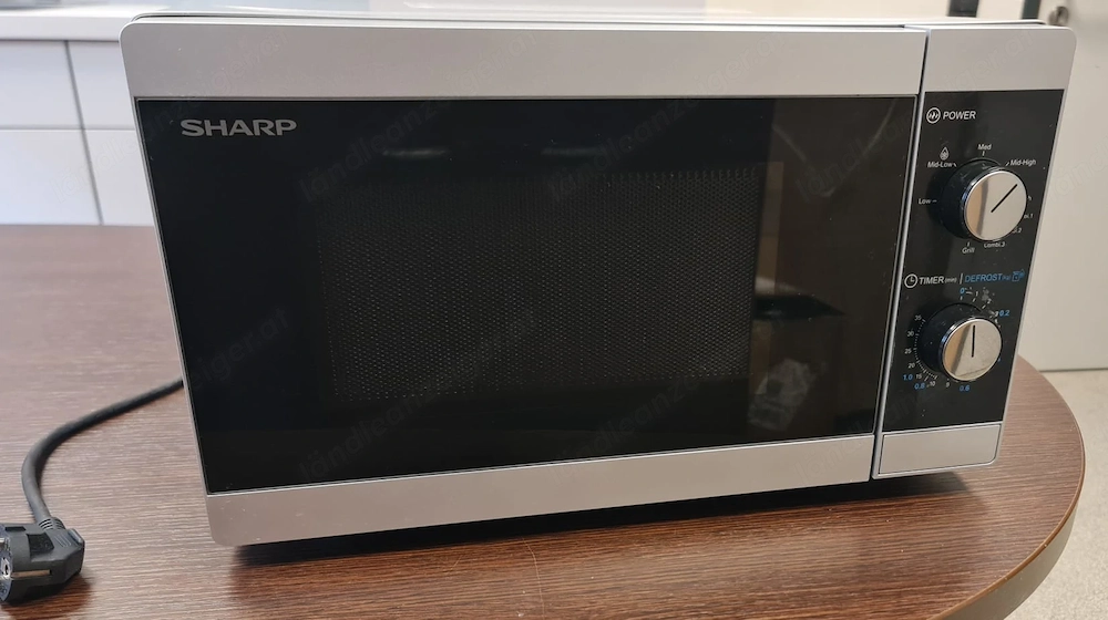 Neuwertige Mikrowelle der Marke Sharp YC-MG01