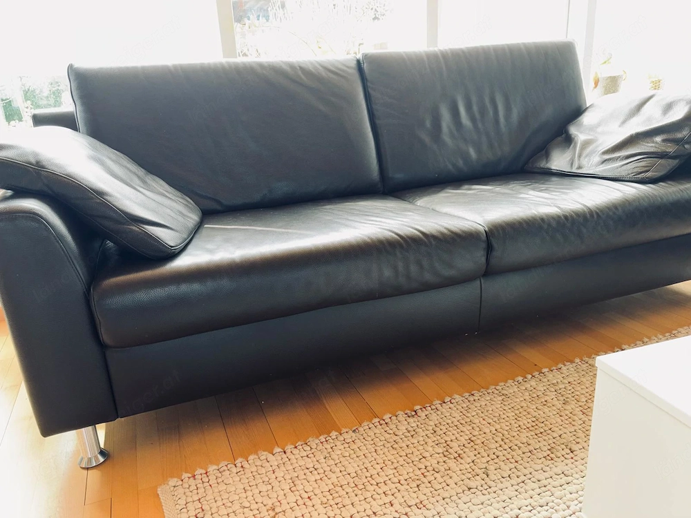 Dunkelbraune Ledercouch zu verschenken