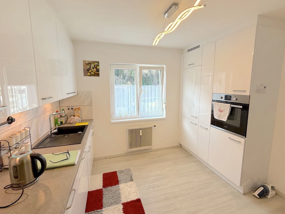 Gepflegte 5 Zimmerwohnung mit Garage