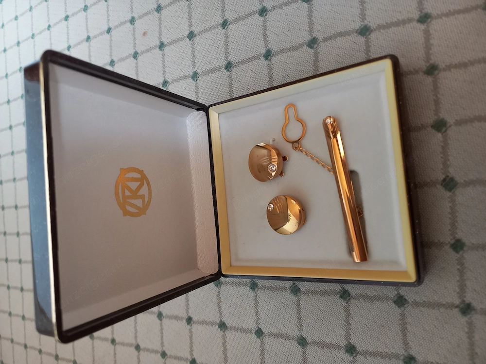 Manschettenknöpfe und Kravattennadel