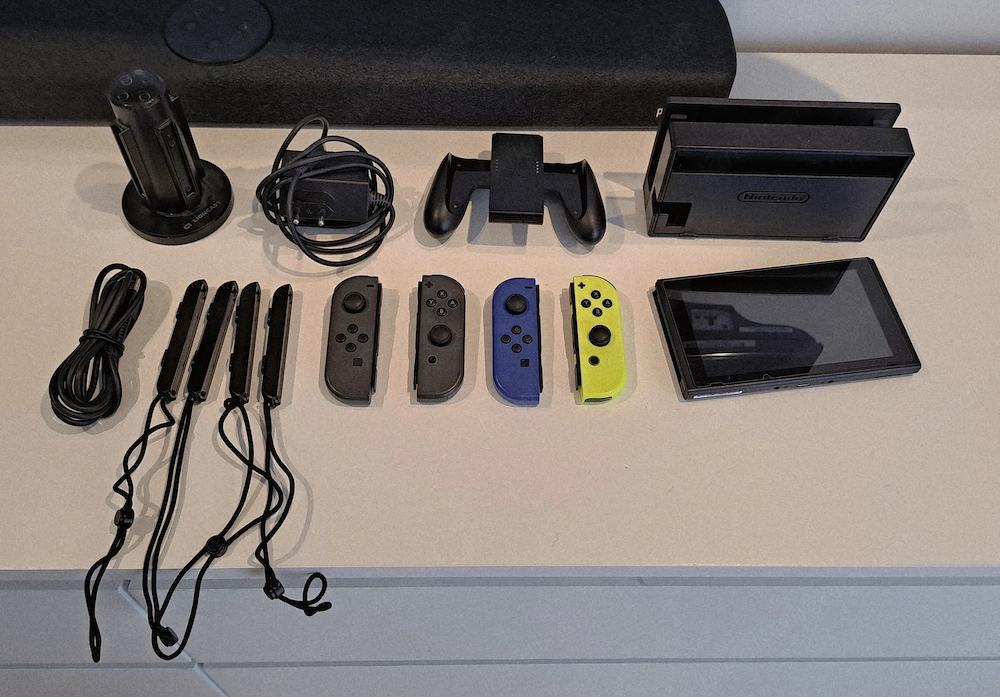 Nintendo Switch mit 4 joy cons und Ladestation