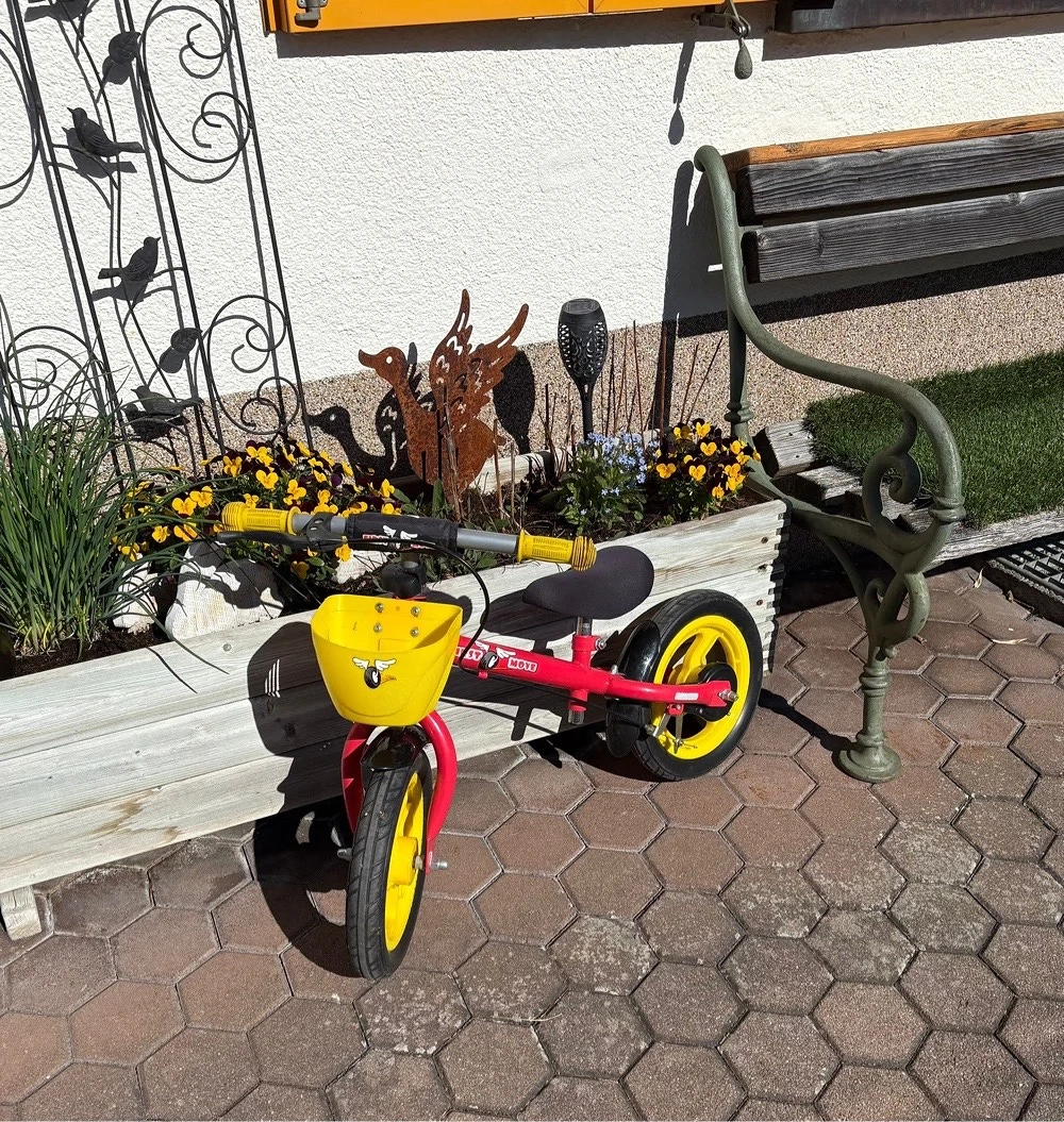 Laufrad rot gelb
